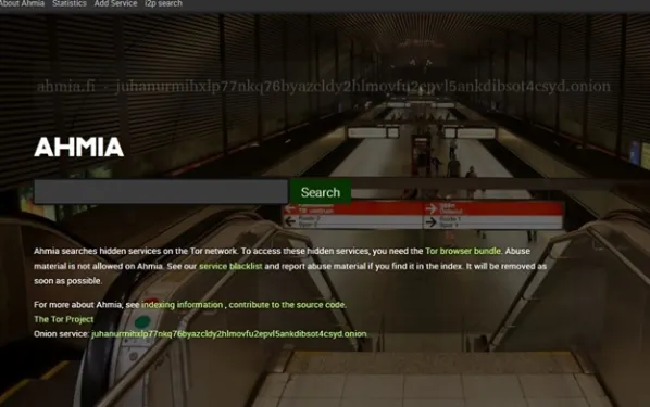 The Ahmia search engine homepage, showing its search box and a note that abuse material is not allowed, with its .onion address listed